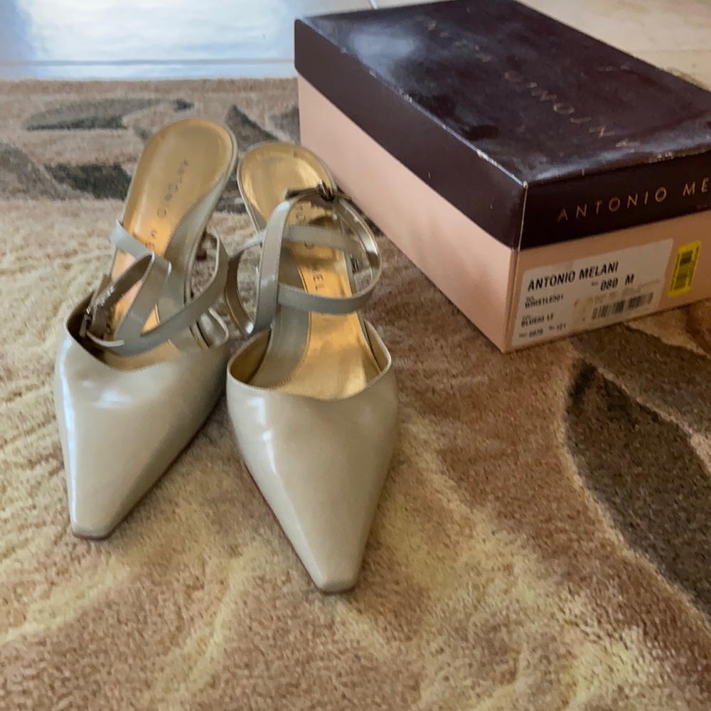 Barely worn, 3.5inch, sling heels in sage green.